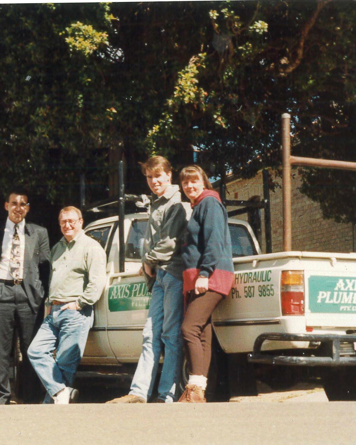 Clem, George and the early Axis Plumbing team with the first ute, 1990s